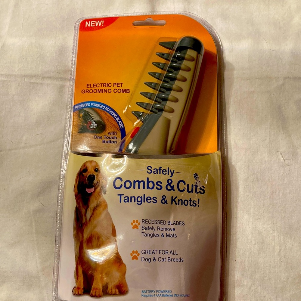 Electronic pet grooming comb with one touch button great for dogs and cats